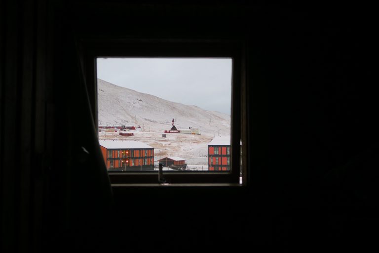 The view from Spitsbergen Basecamp Hotel. Svalbard accommodation ranges from cute cabin-type rooms to ex-miner accommodation.