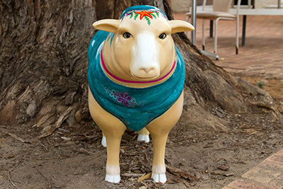 A sheep statue dressed like a 1920s flapper. Discover the painted sheep nestled about the small Western Australian town of Northampton.